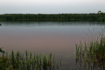 The evening fell on the village lake of the Russian hinterland.