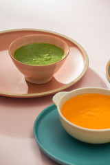 Bowls with baby food. Various bowls of fruit and vegetable puree with ingredients for cooking