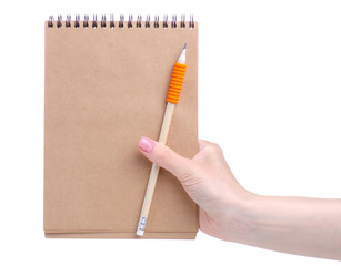 notepad and pencil in hand on white background isolation