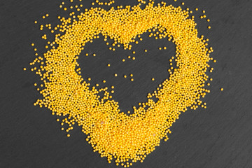 Colored sugar candy sprinkles confetti close up view