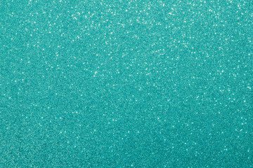 blue glitter macro background. Close-up shot of glittery texture.