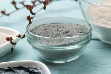 Cosmetic clay. clay facial mask on a gentle blue background. different types of clay. natural...