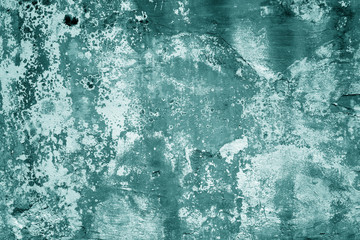 Grungy cement wall texture in cyan tone.