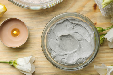 Cosmetic clay. clay mask for the face on a natural wooden background. different types of clay. natural cosmetics for cosmetic procedures. Beauty concept. top view