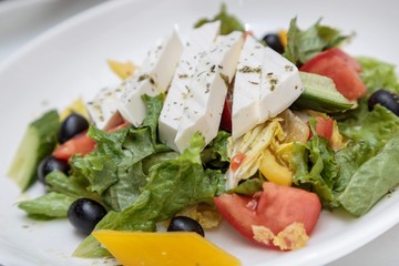 Vegetable salad on a white plate