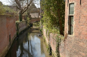 Fototapeta na wymiar Brick bridge over the canal in Leuven, Belgium