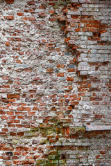 destroyed brick wall of the old house