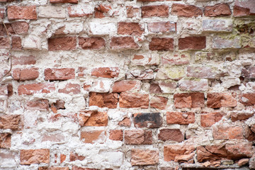 destroyed brick wall of the old house