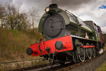 Fototapeta na wymiar Speeding steam train