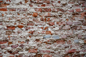 destroyed brick wall of the old house
