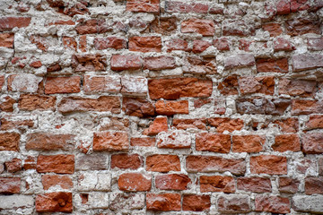 destroyed brick wall of the old house