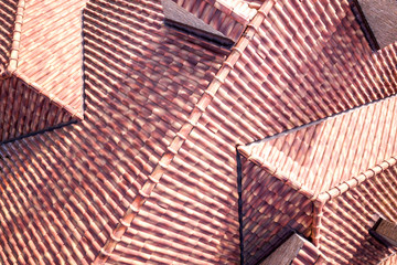 Top aerial view of building complex shingle roof construction. Abstract background.