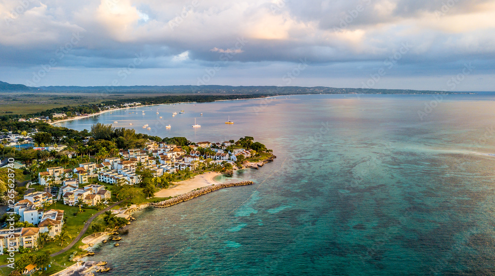 Wall mural aerial images of jamaica negril carribean beach sand ocean sunset vacation