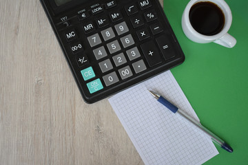 Clean sheet with pen and calculator.