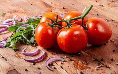 Fresh fragrant salad with tomatoes, cucumbers, onions, parsley, dill and lettuce leaves. Vegetarian...