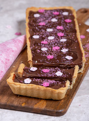 Homebaked Dark and Milk Chocolate Truffle Tart. Decorated.