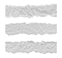 Scraps of light grey paper on a white background. Isolated on white. Ready frame for design, template. Torn paper