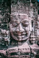 Stone face in Bayon Temple, Angkor Wat, Siem Reap, Cambodia.