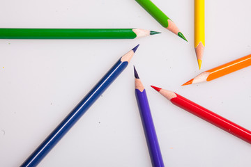 color pencils in circle isolated on white background