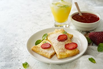 Homemade sweet Crepes with ricotta filling / Thin pancakes with cheese stuffing