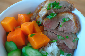 Roast duck rice bowl with squash