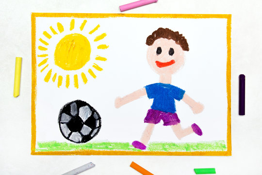 Colorful drawing: smiling boy playing football