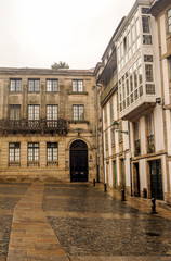 Fototapeta na wymiar Street of the city of Santiago de Compostela in the north of Spain in a cloudy day.