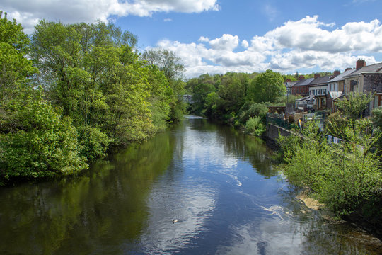 The River liffey in Dublin, Ireland viewed from Chapelizod Bridge.