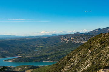 Fototapeta premium View on blue Lac de Sainte-Croix lake near Verdon gorges in Provence, France