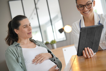 Pregnant woman at doctor's office