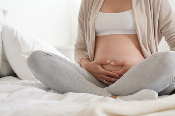 Closeup of pregnant woman belly