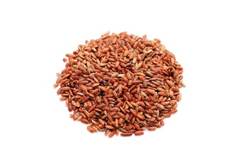 brown rice scattered on a white background