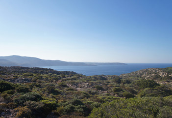 View of the blue azure sea lagoon gulf of the ocean. Summer heat nature on the southern island of the mountain rocks stones. © Payllik
