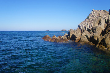 View of the blue azure sea lagoon gulf of the ocean. Summer heat nature on the southern island of the mountain rocks stones.