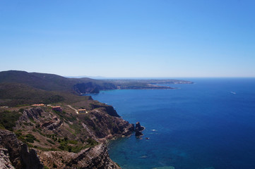 View of the blue azure sea lagoon gulf of the ocean. Summer heat nature on the southern island of the mountain rocks stones.