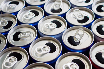 Empty aluminium drink cans recycling background concept