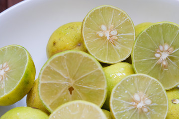 lemons and limes on white background