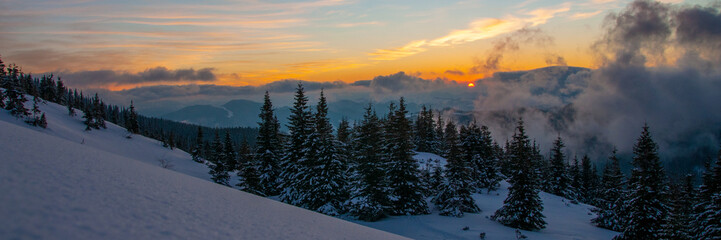 Amazing landscape in the winter mountains at sunrise