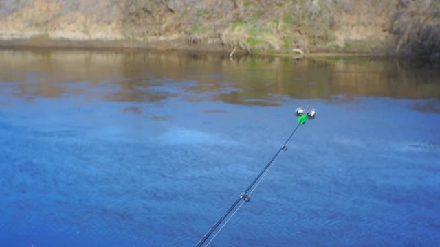 Feeder fishing on the river bank.1920X1080 Full Hd.