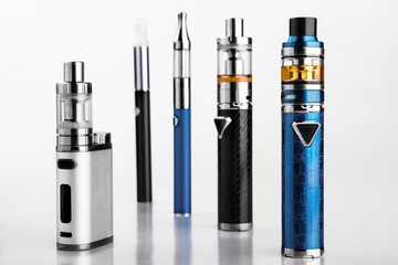 electronic cigarettes or vaping devices on white background