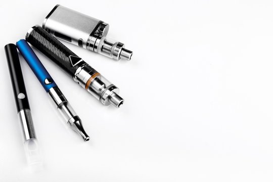 electronic cigarettes or vaping devices on white background