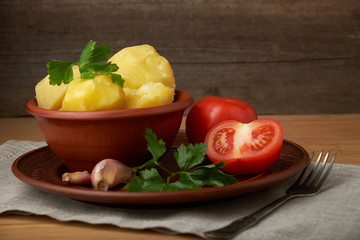 vegetarian food potatoes with tomatoes garlic and parsley