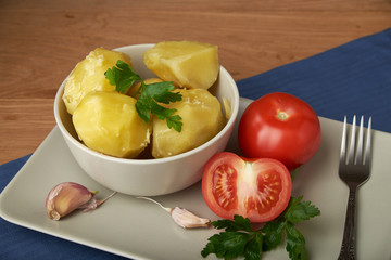 vegetarian food potatoes with tomatoes garlic and parsley