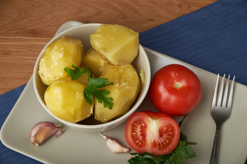 vegetarian food potatoes with tomatoes garlic and parsley