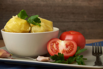 vegetarian food potatoes with tomatoes garlic and parsley