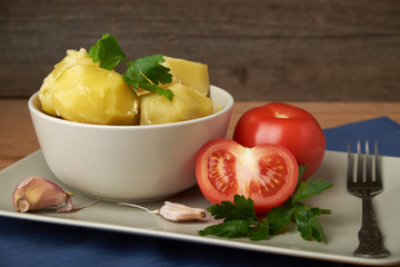 vegetarian food potatoes with tomatoes garlic and parsley