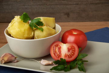 vegetarian food potatoes with tomatoes garlic and parsley
