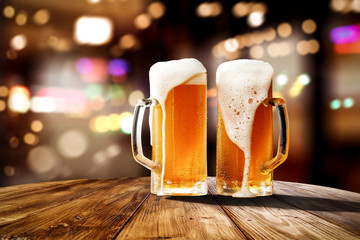 Fresh cold beer in glass and free space for your bottle. Bar interior background  - 265662593