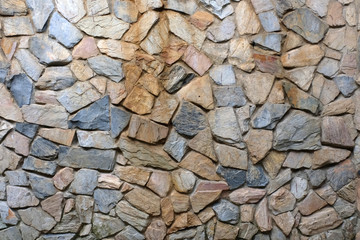 Fragment of a wall from a chipped stone background