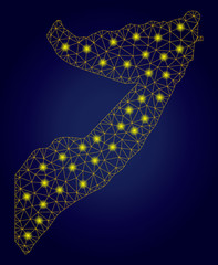 Yellow mesh vector Somalia map with glare effect on a dark blue gradiented background. Abstract lines, light spots and spheric points form Somalia map constellation.